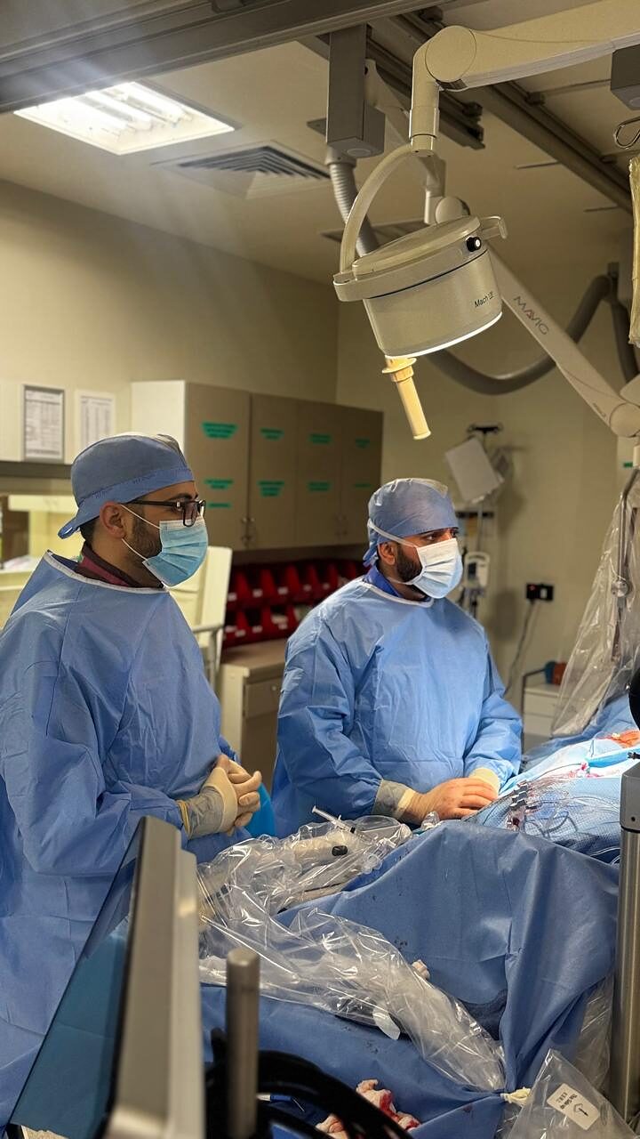 Dr Shady Habboush in the cath lab (With colleagues)